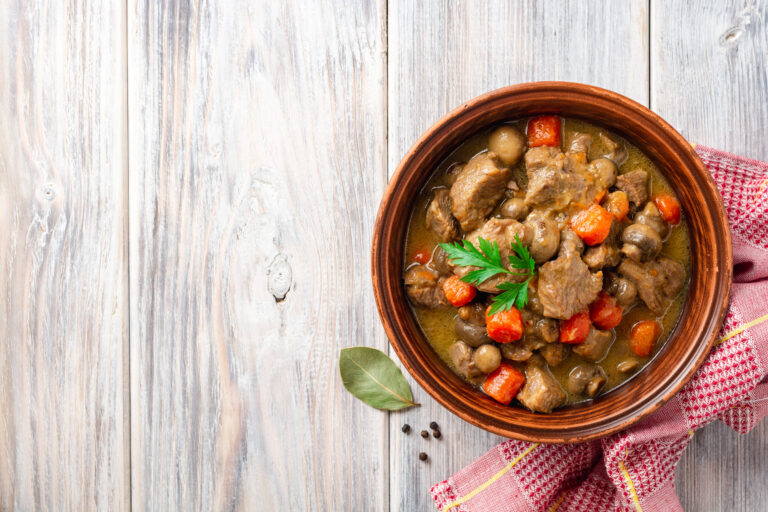 Turkey,Meat,Stew,With,Mushrooms,And,Vegetables,In,Ceramic,Bowl